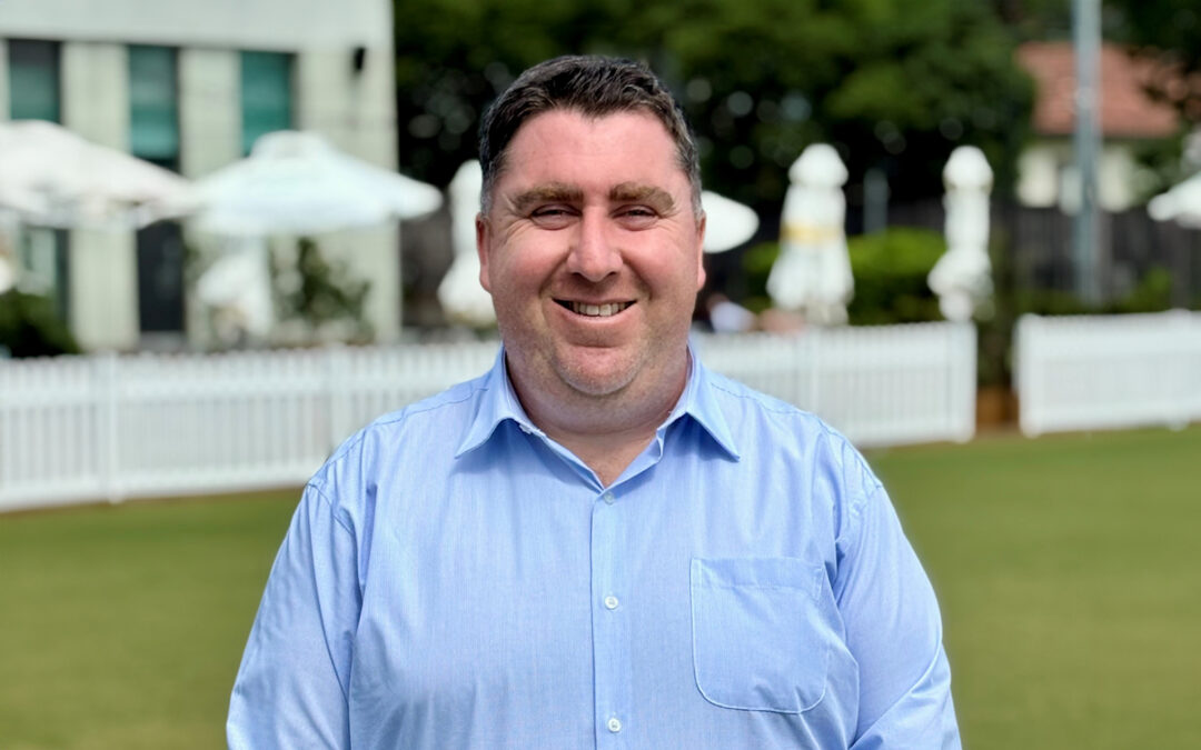 Engadine Bowling Club General Manager Chris Roberts on the bowling green wearing a blue shirt